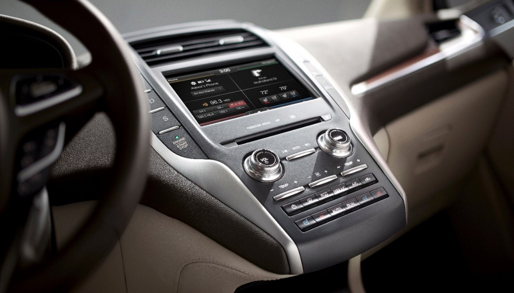 Notice push-to-start button is immediately below the bush-button gear selector in 2015 MKC